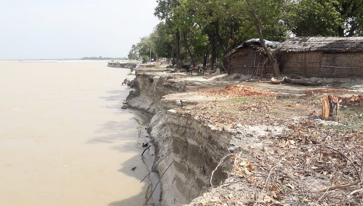 two house flow in river