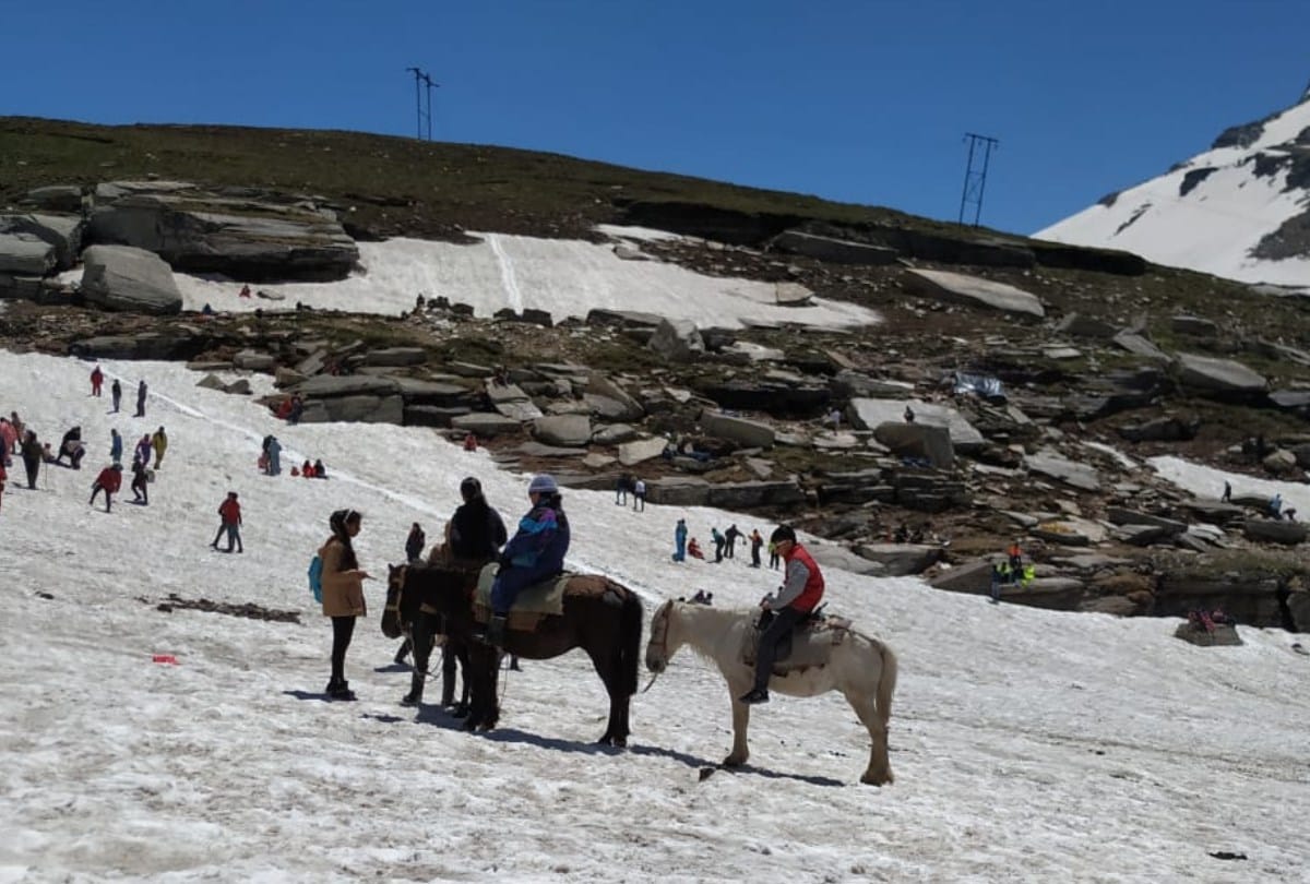 Tourist enjoy fresh snowfall in Rohtang Pass Lahaul Kullu Himachal Pradesh