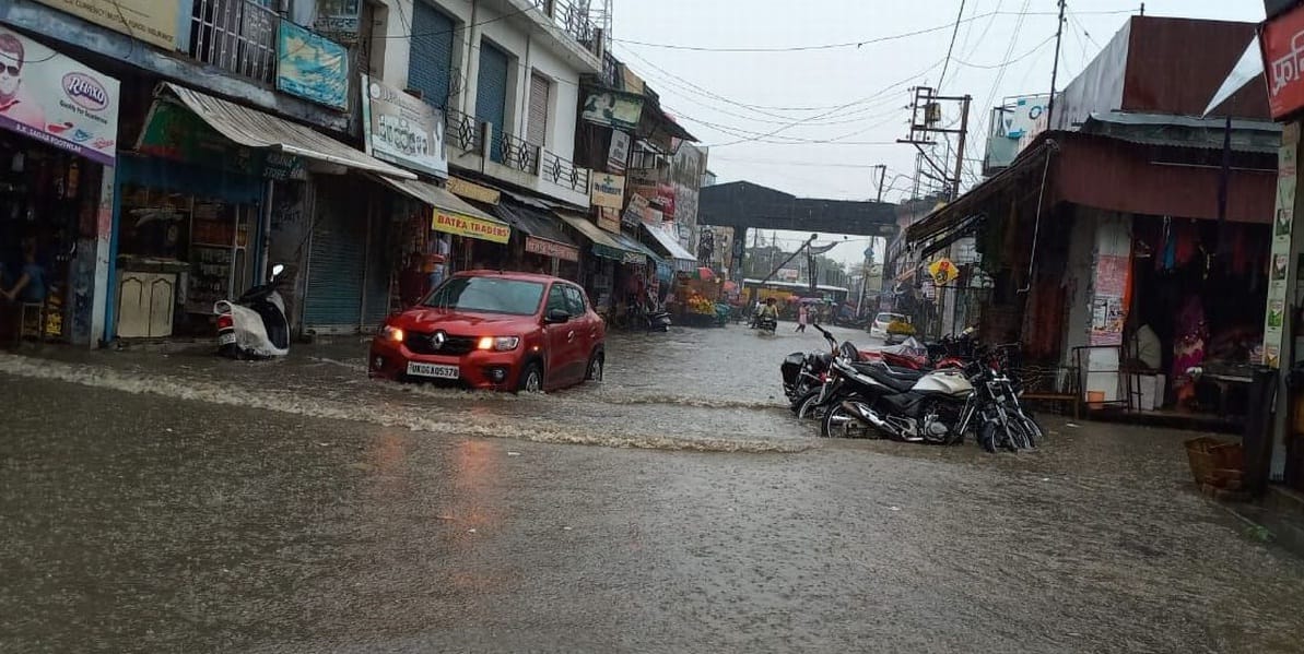 The city's roads are submerged by rain