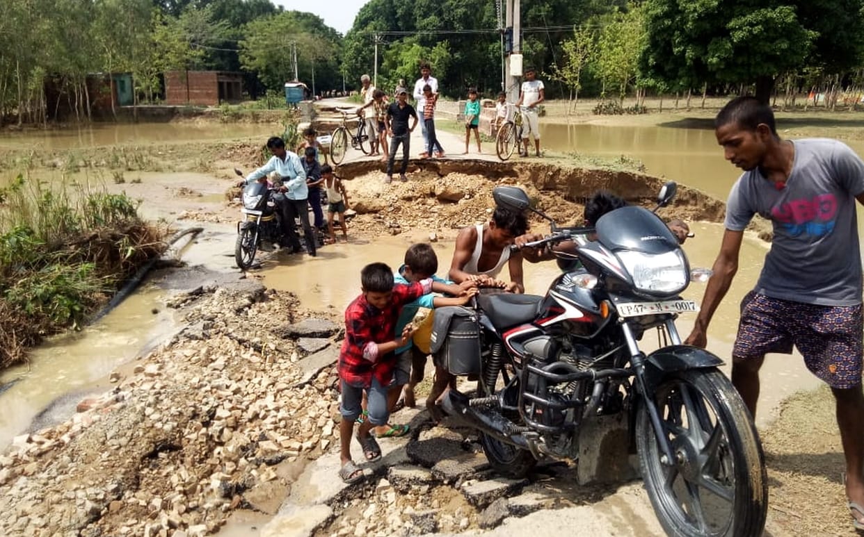 road interrupted by flood