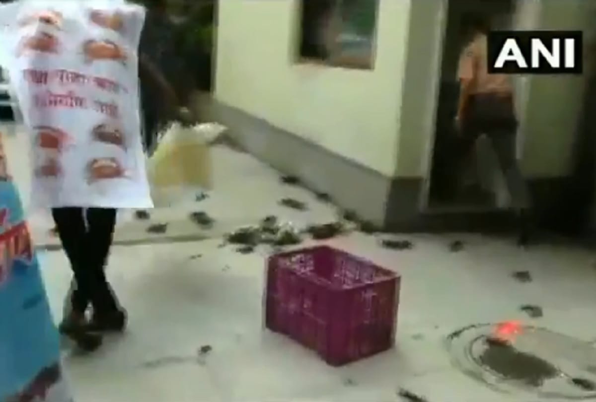 NCP workers stage protest and threw crabs outside the residence of Tanaji Sawant