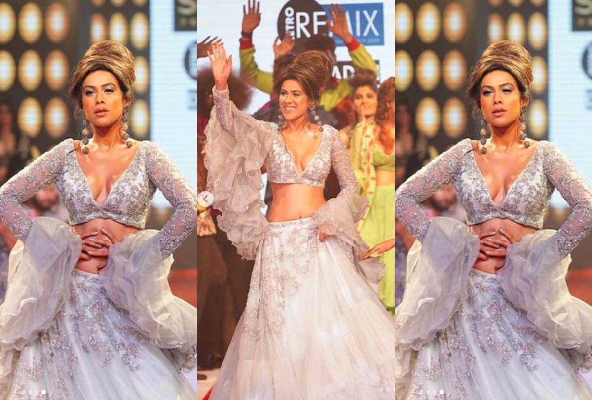 nia sharma stunning look in white lehenga during fashion show in dehradun