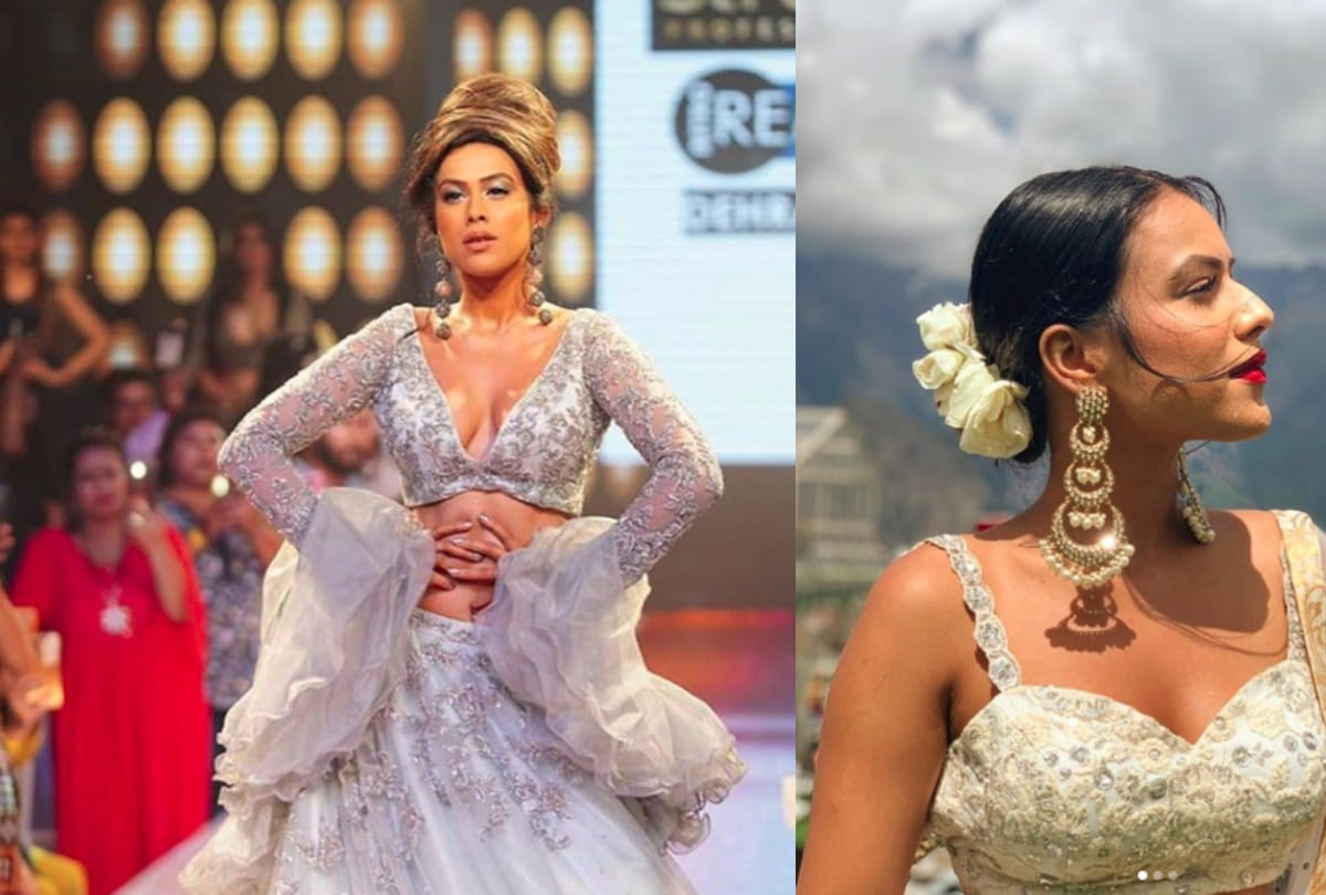 nia sharma stunning look in white lehenga during fashion show in dehradun