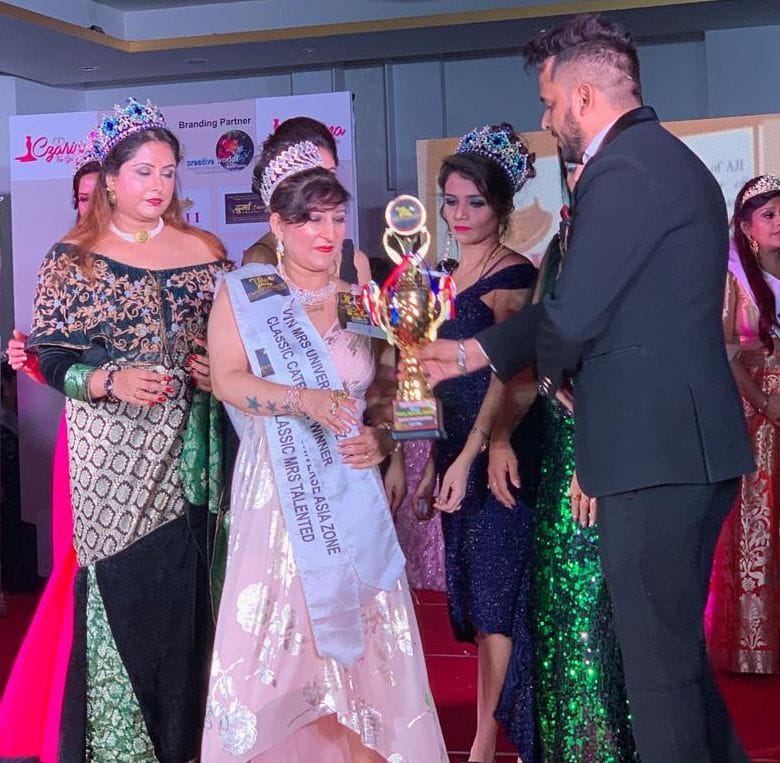 neema wins mrs universal title