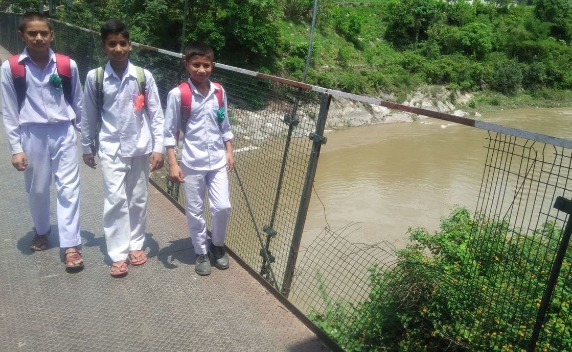 walk carefully while going through saryu jhula bridge
