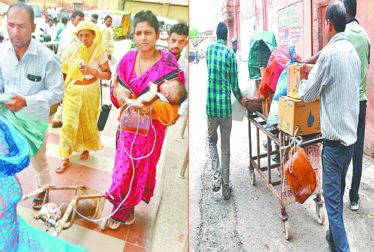 woman carrying oxygen cylinder with patient in sn medical medical agra