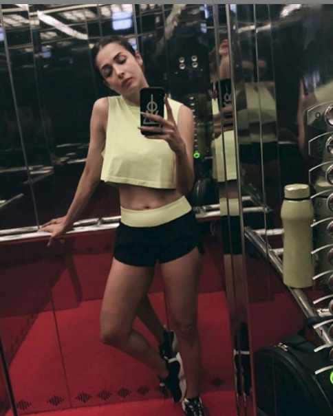 malaika arora looks stylish in her neon crop top and shorts outside gym