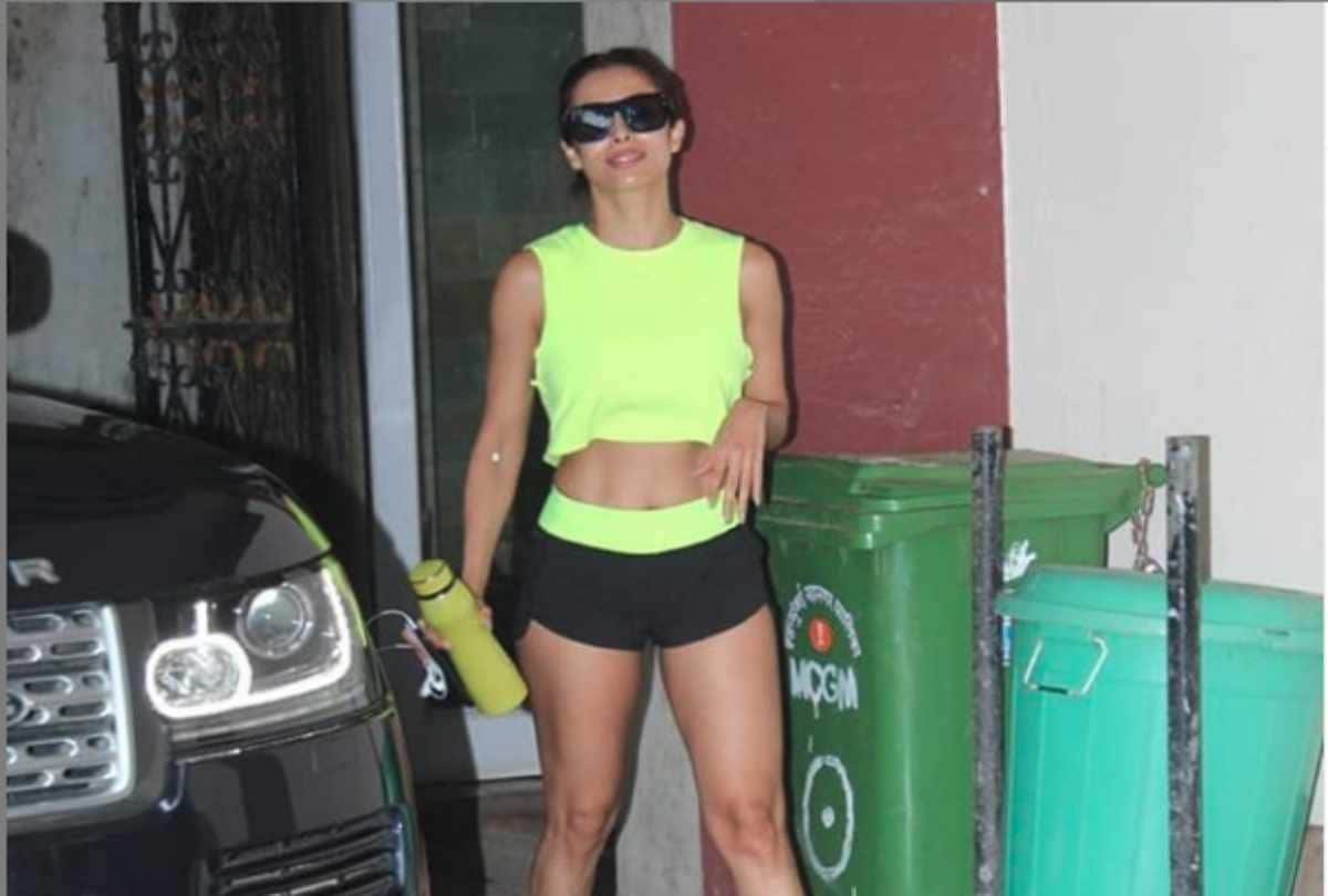 malaika arora looks stylish in her neon crop top and shorts outside gym