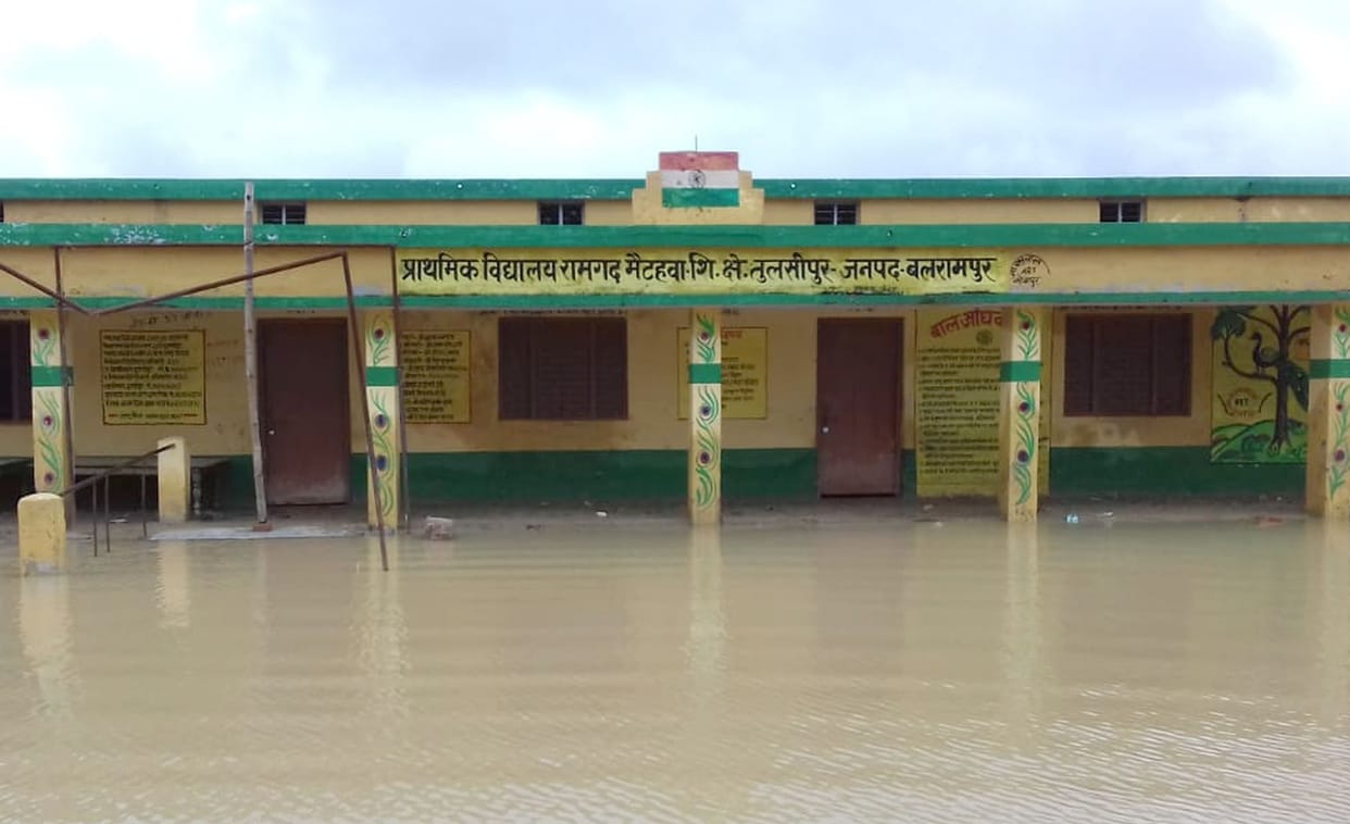 schools surrounded by flood