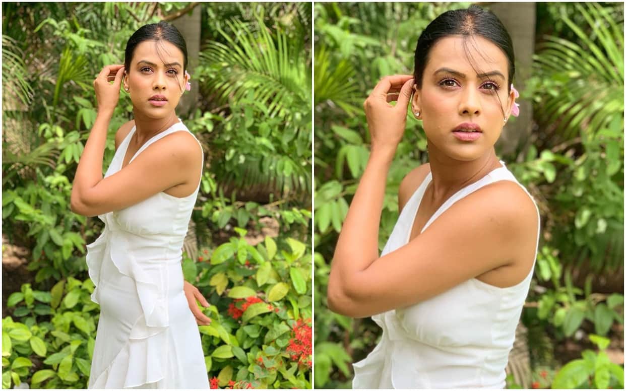 Nia Sharma Gets trolled by users for flashes her tummy in white outfit