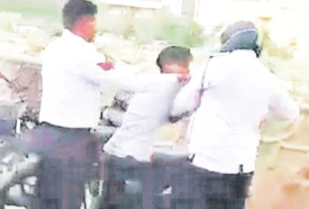 viral video two boys beating traffic police cop at delhis netaji subhash place arrested