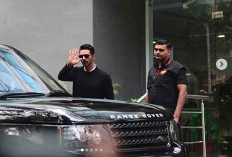 arjun rampal and gabriella demetriades take their baby boy home pose with media