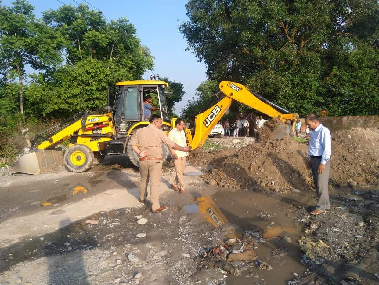 Mining ditch on roads to stop mining