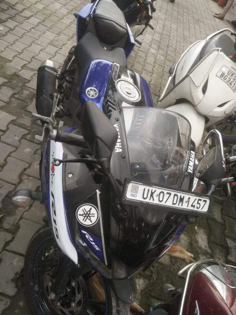 Three youths invoice on bike stunt