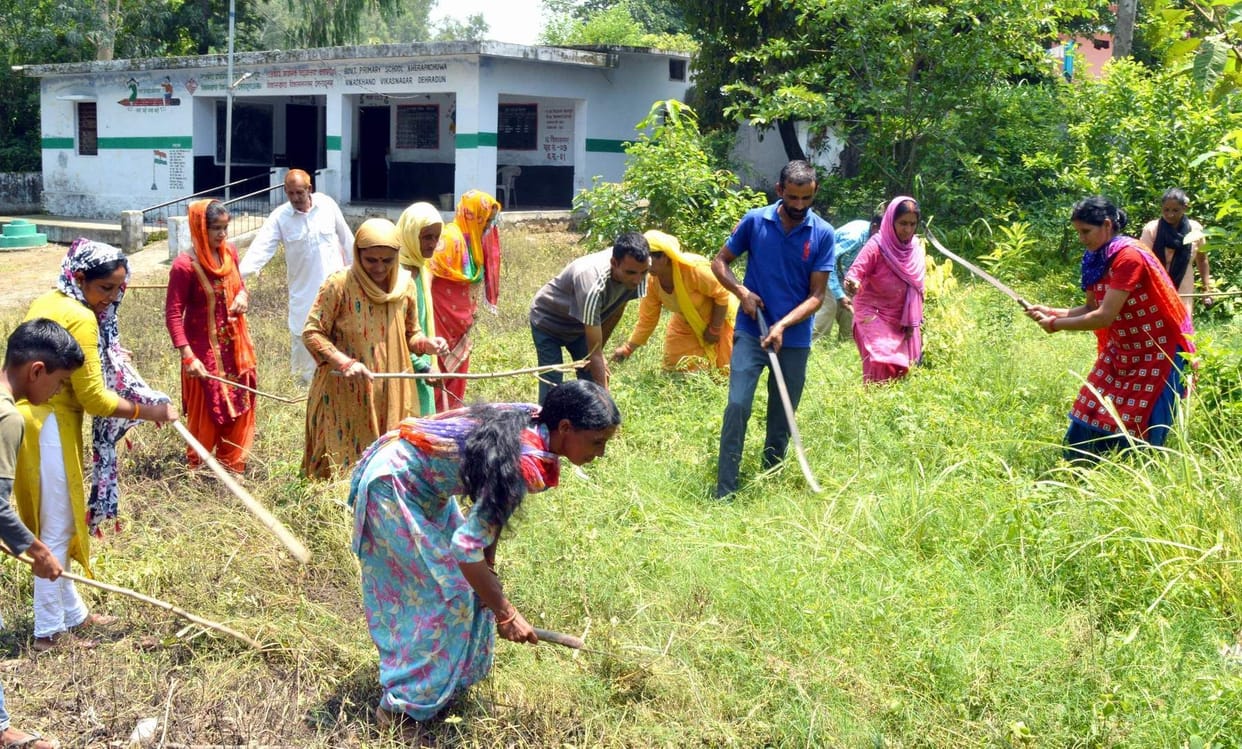 Cleaning of villagers in school premises
