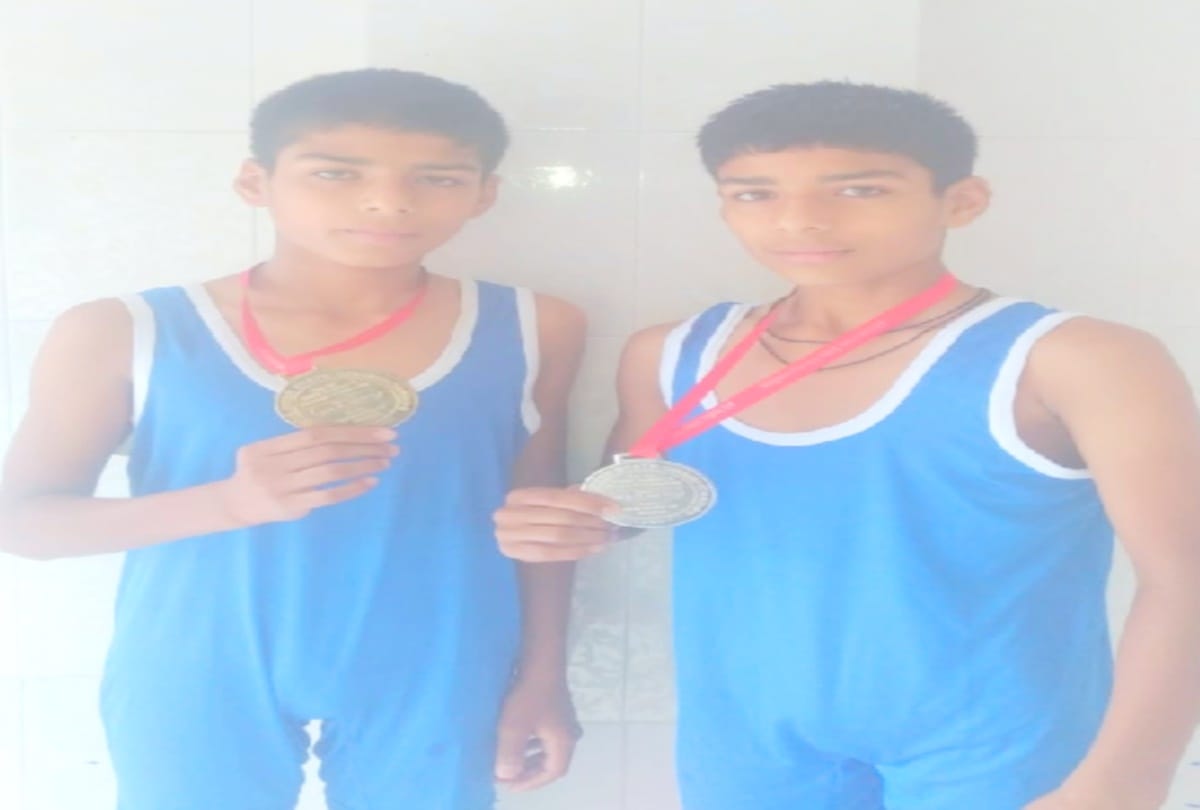 twin wrestling brothers won Gold and silver medal after participating in games with donation money