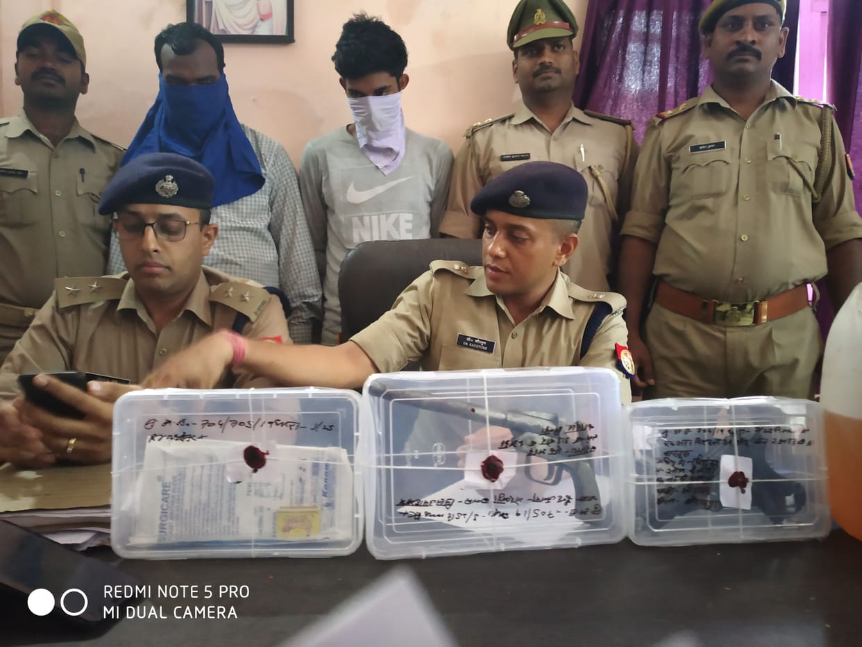 two arrest with weapons