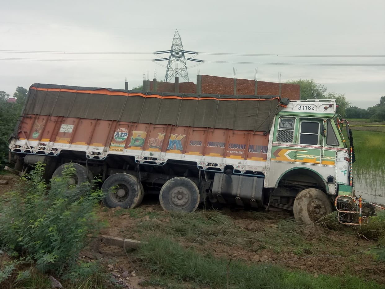 Truck crushes two people, death