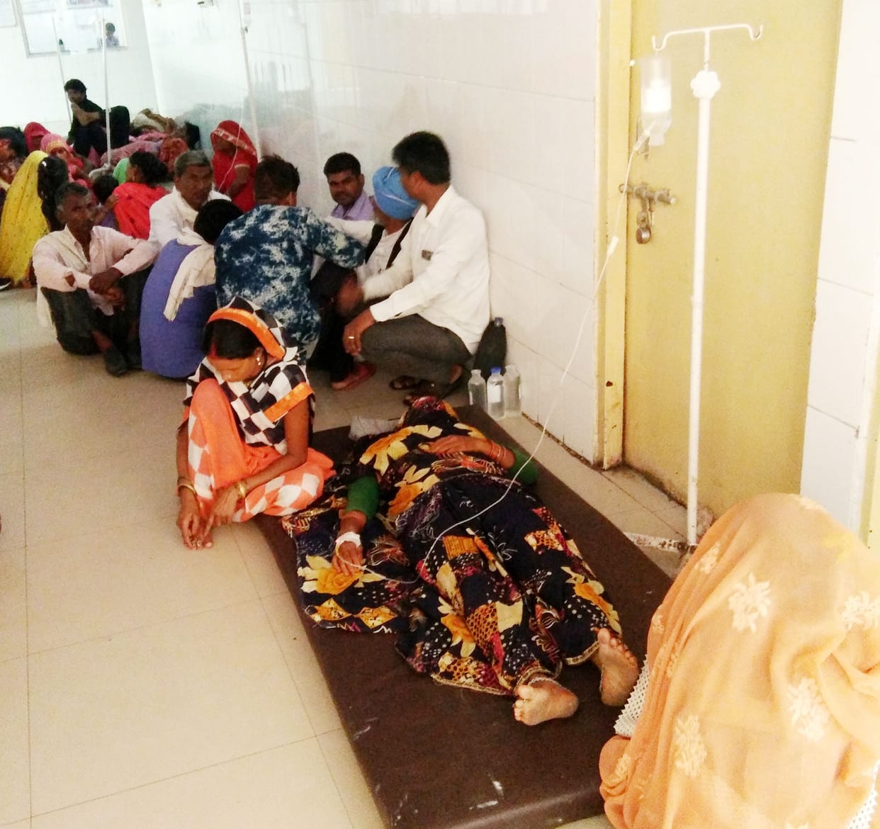 patients being treated on floor in district hospital