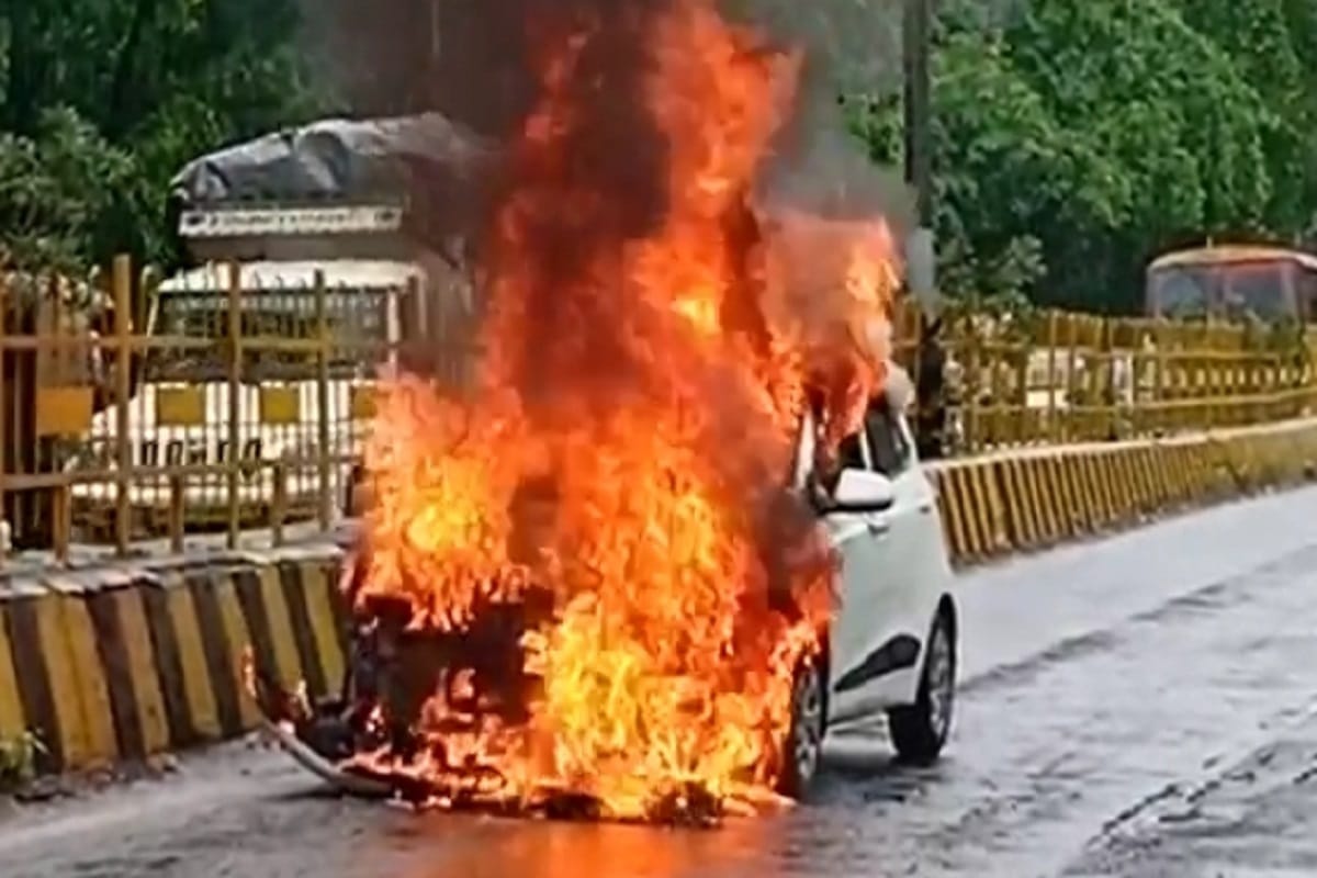 Heavy traffic jam after fire in a car in highway at Meerut district