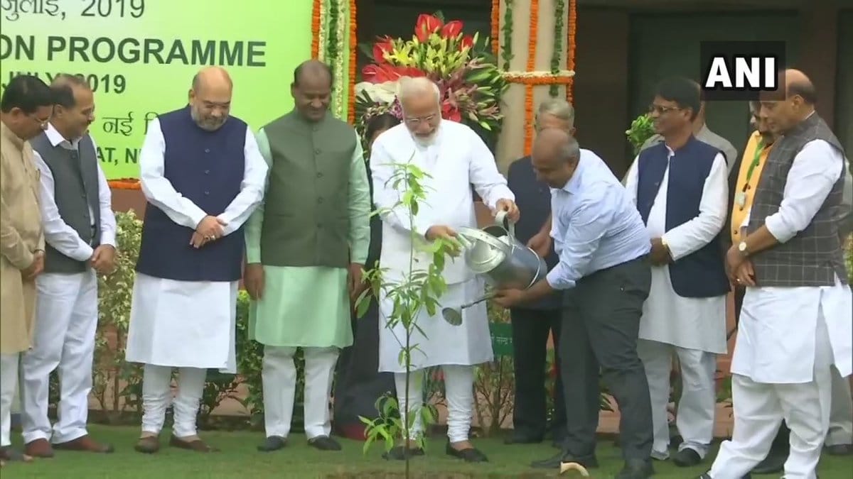 Prime Minister Narendra Modi plants a tree in Parliament