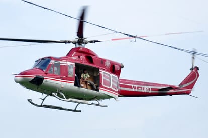 Flower petals on kanwariyas by police officers from helicopter in Saharanpur and Muzaffarnagar