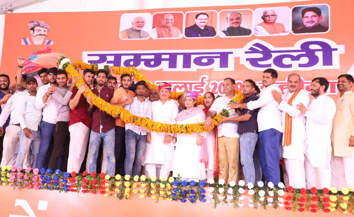 sloganeering against mla in public meetin