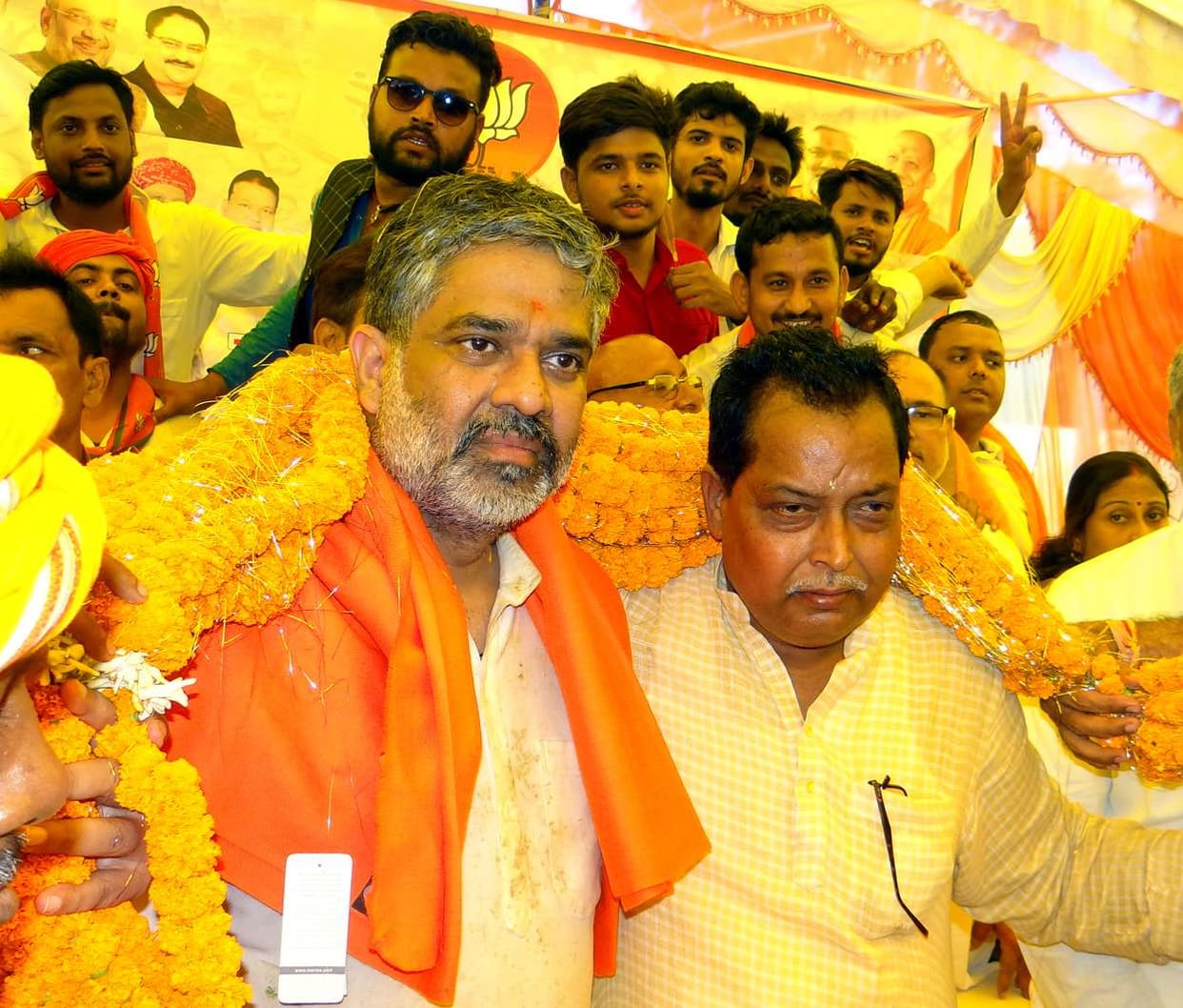 Welcomed by flower garland