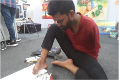 Inspirational Story: handicapped man Sunil Kumar makes painting by foot