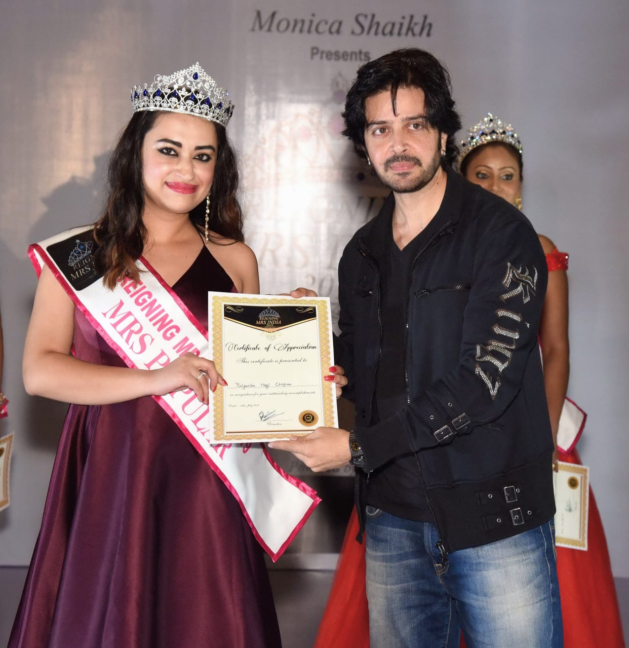 assistant professor win resioning Mrs india award