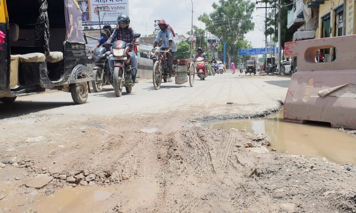 waterlogging raod narrow traffic jam after rain in manduadih varanasi