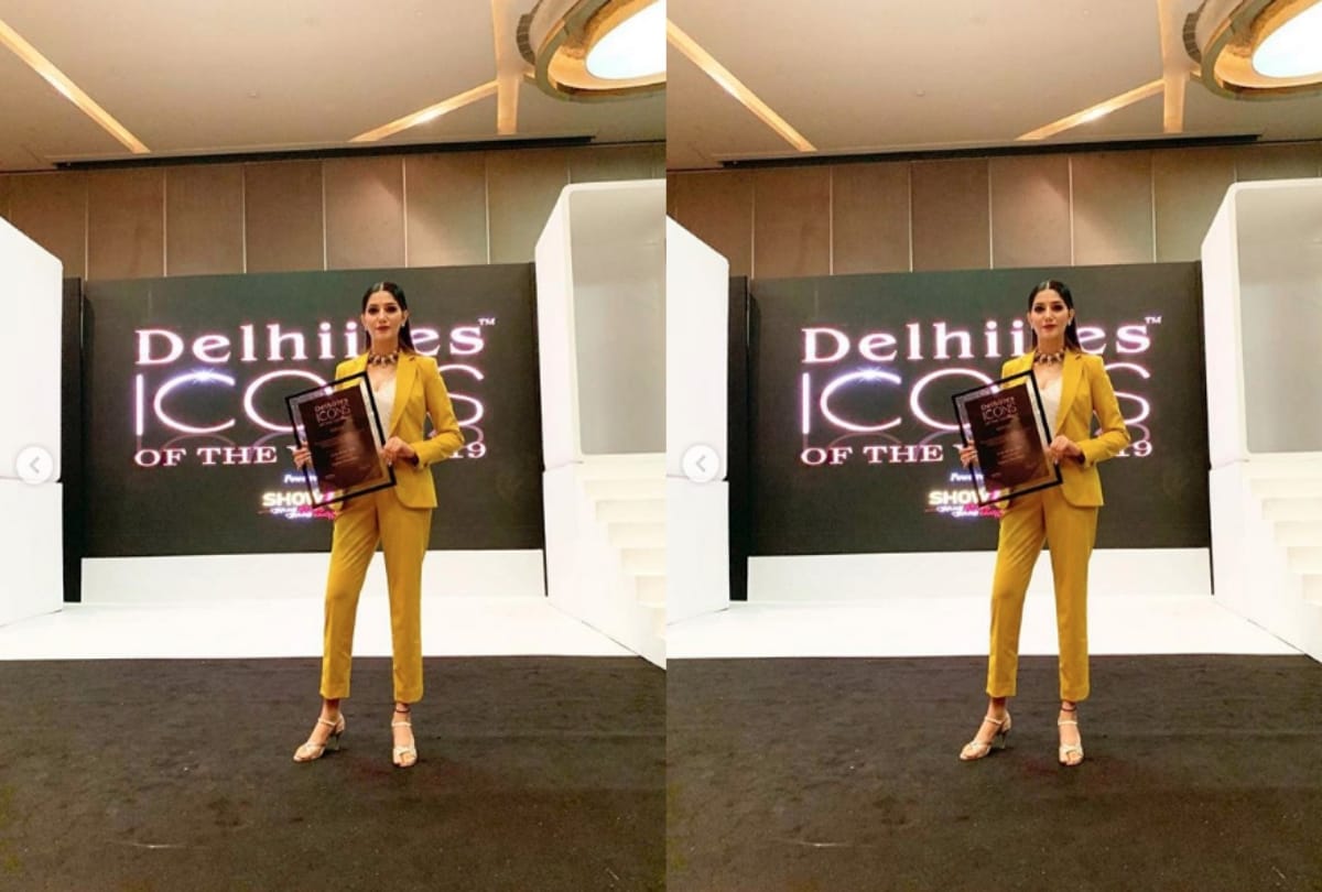 Sapna Choudhary looks gorgeous in this yellow pantsuit