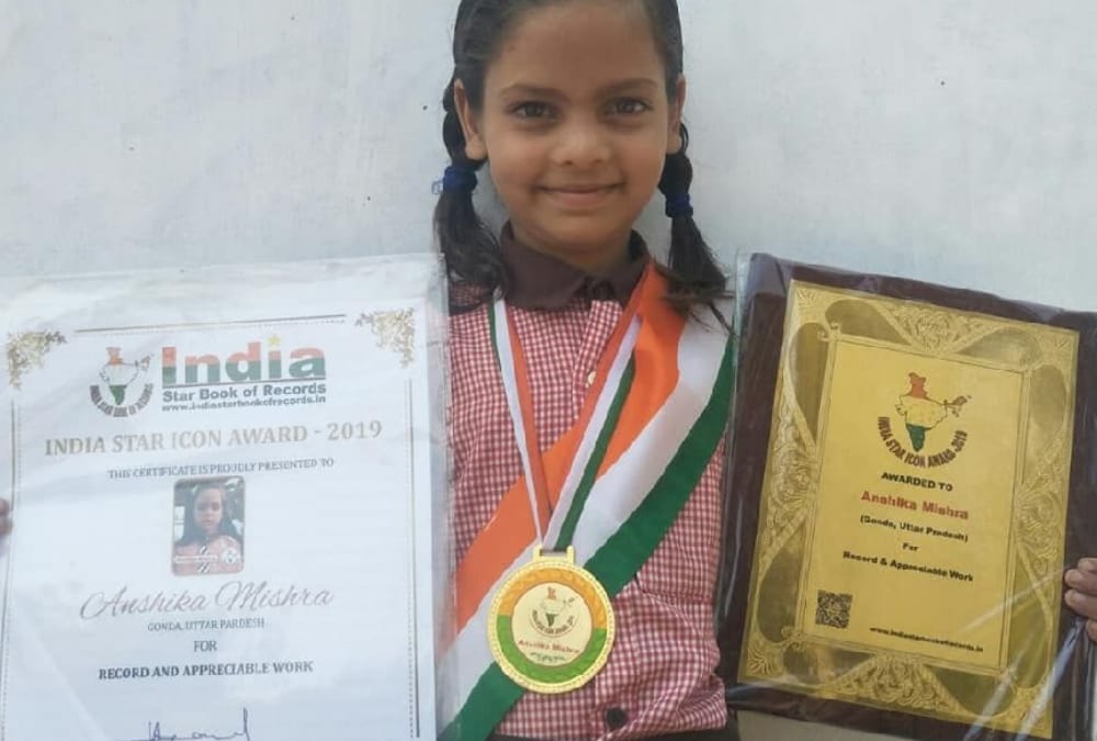 anshika becomes grand master of asia book of records.