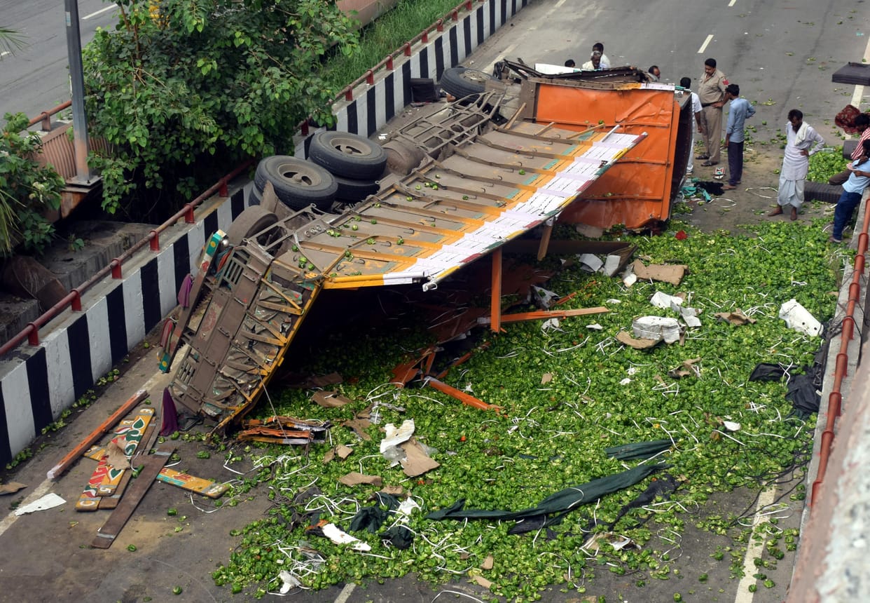 Truck fall from flyover, driver died, Delhi