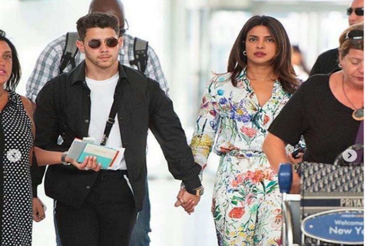 priyanka chopra reached in black dress with nick jonas at joe jonas birthday party
