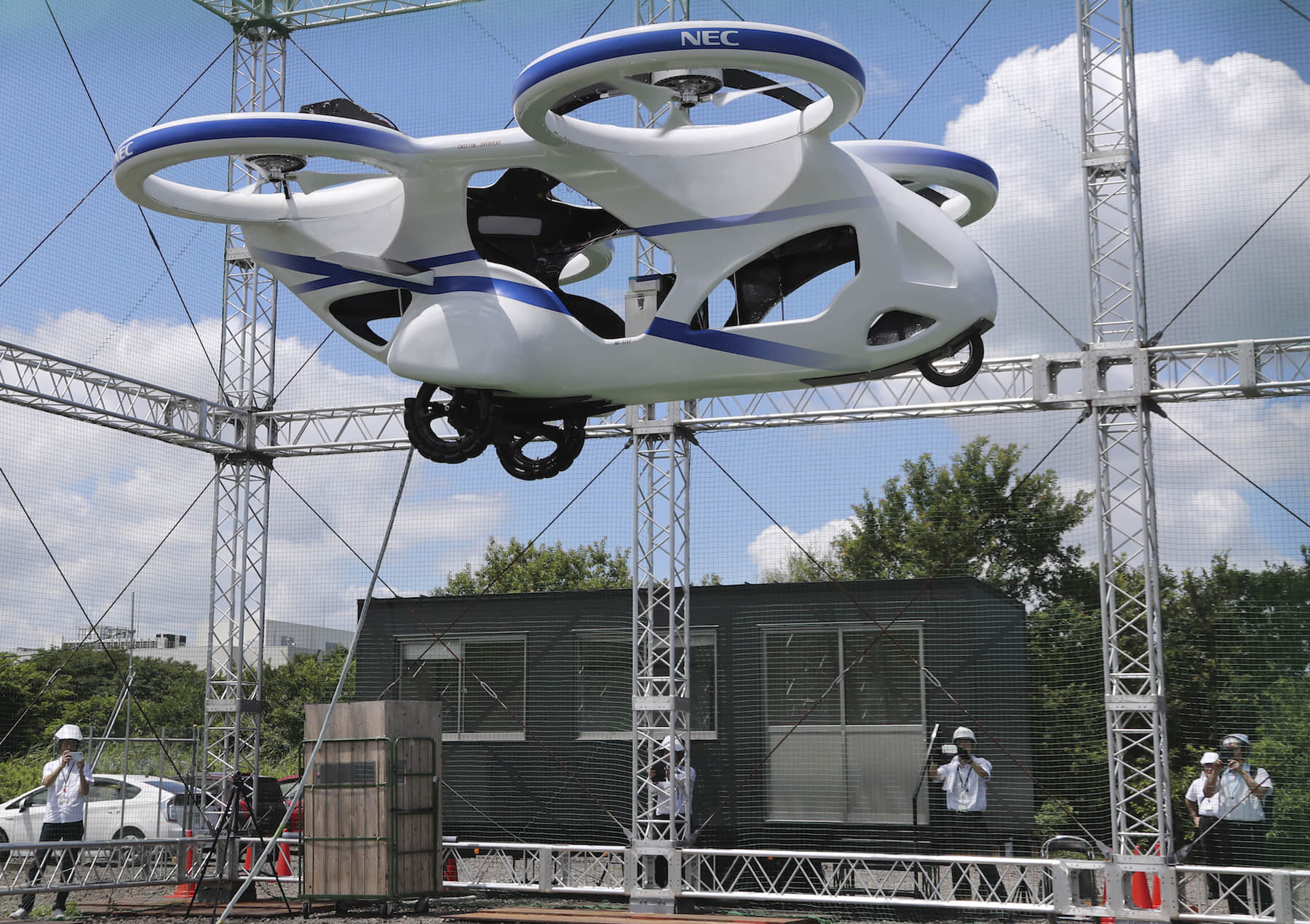 Japanese electronics maker NEC Corp on monday tested the unmanned flying car