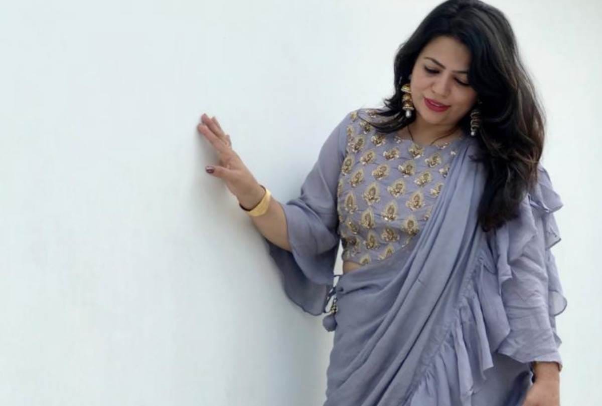Ruffle dress and saree prepared by fashion designer Shikha suri