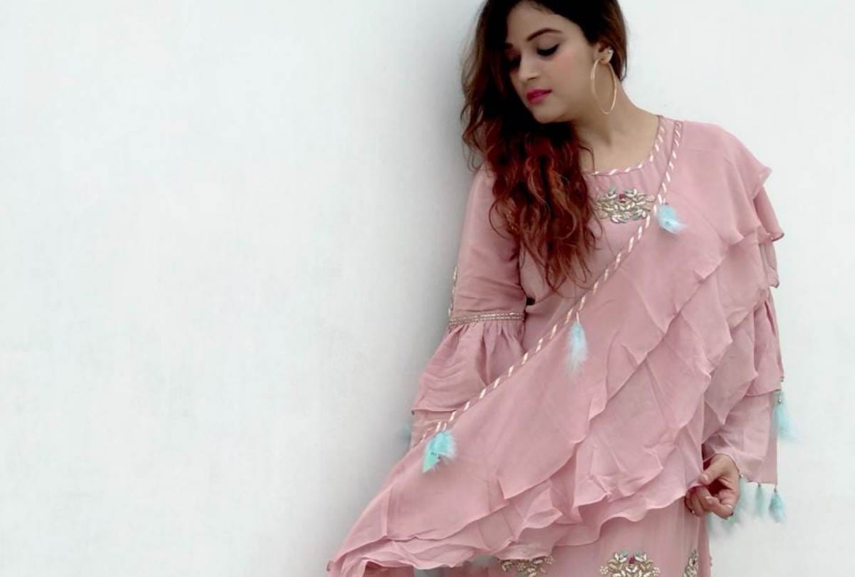 Ruffle dress and saree prepared by fashion designer Shikha suri