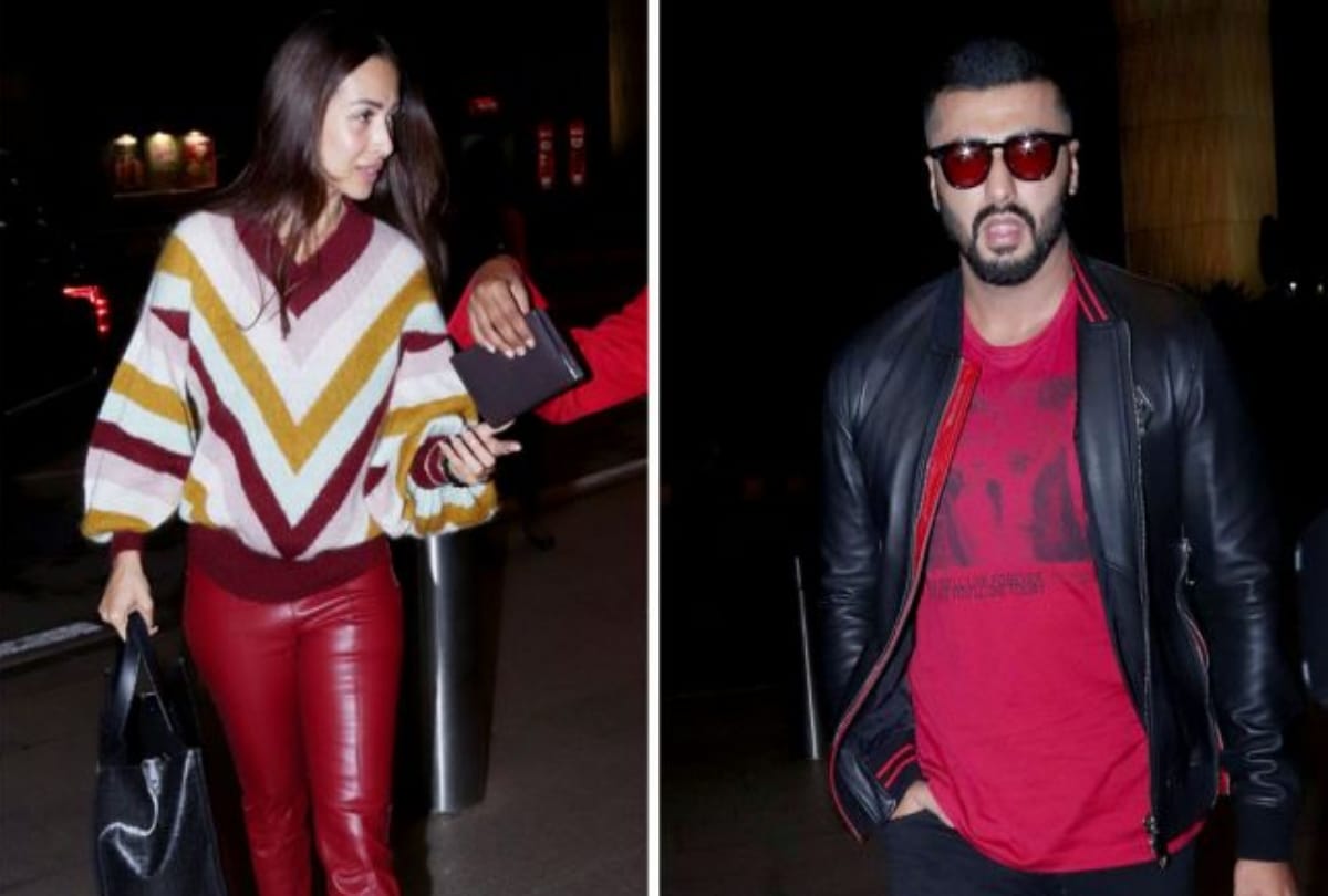 Arjun Kapoor and Malaika Arora twin in red at Airport