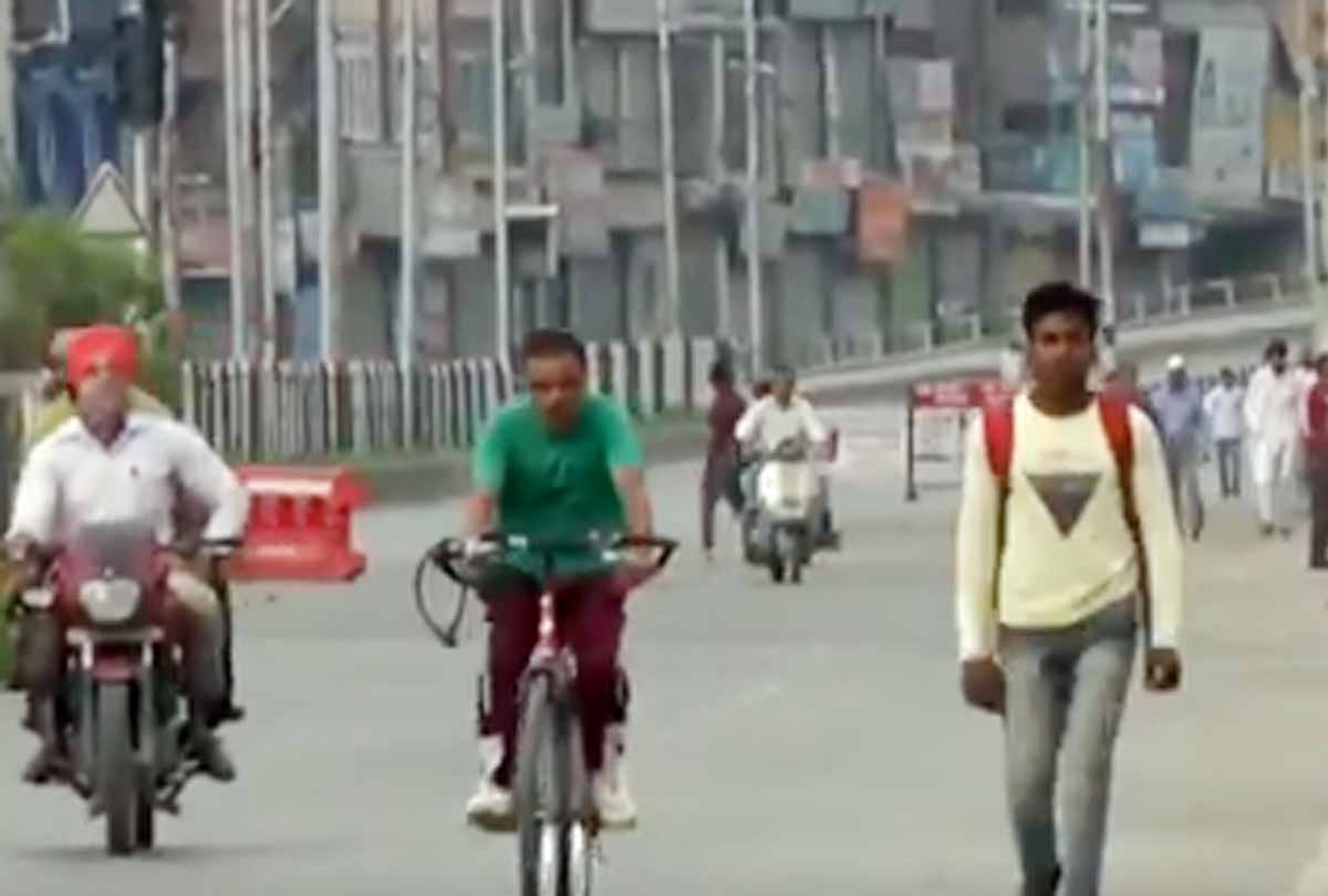 Jammu and Kashmir: Latest visuals from Srinagar as people move about for essential work.