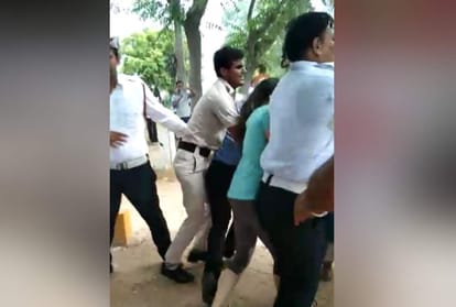 gurugram couple run car over traffic cop but saved beat journalist breaks his camera
