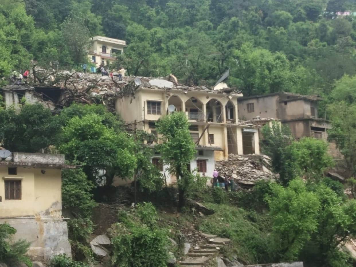 rain in all night in rudraprayag district house and vehicle buried in debris