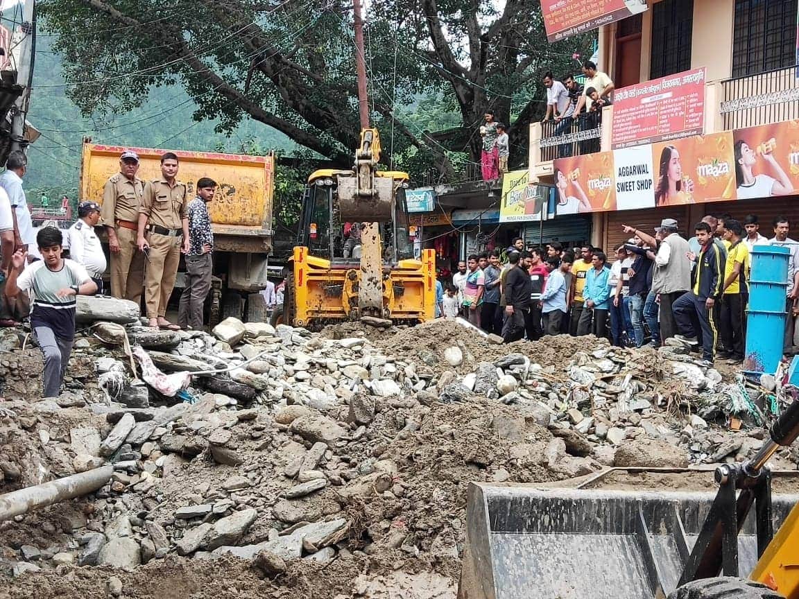 rain in all night in rudraprayag district house and vehicle buried in debris