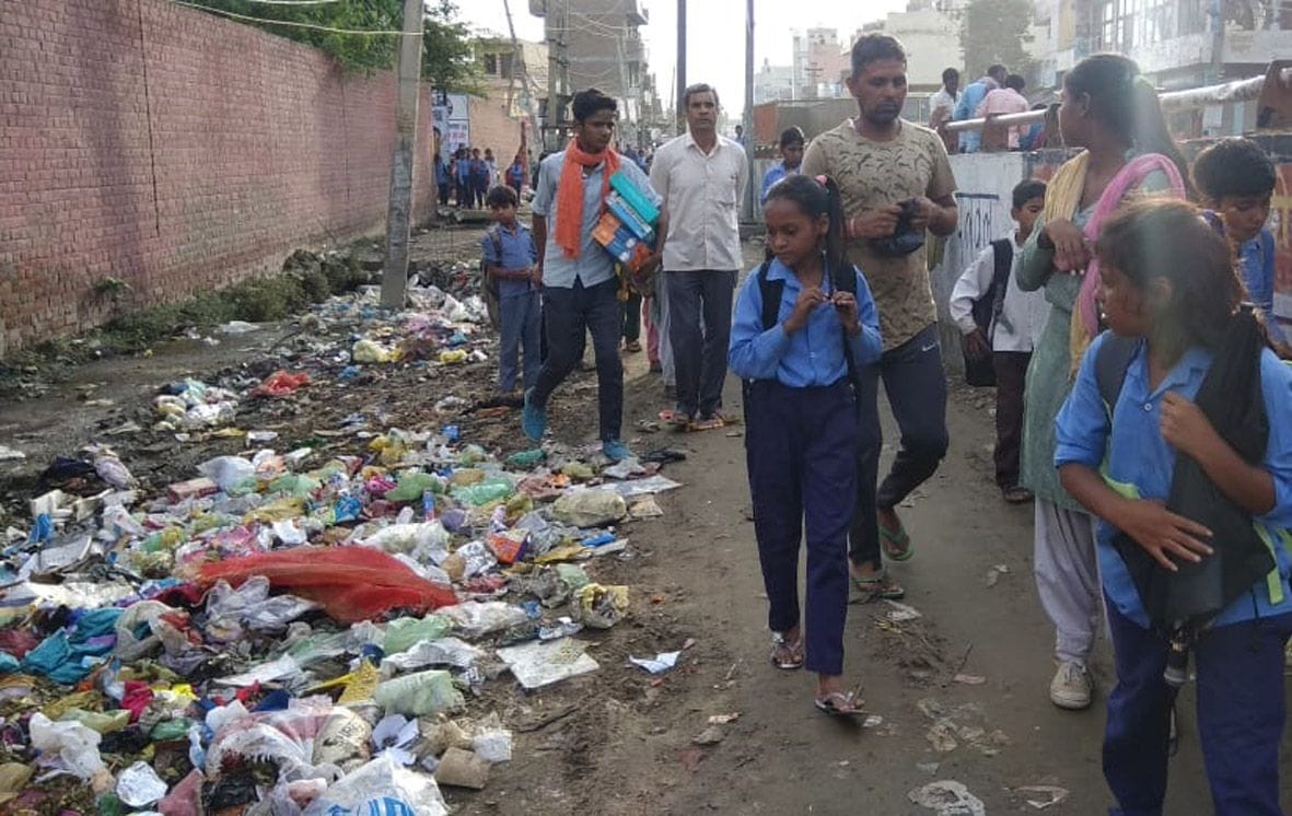People are upset with the pile of dirt in front of the school