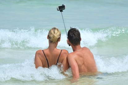 people who post photos with partner is satisfied