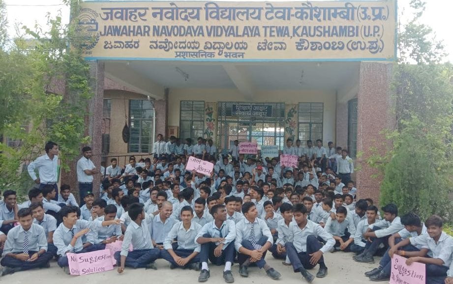 Students sitting on a sit-in protest about school problems