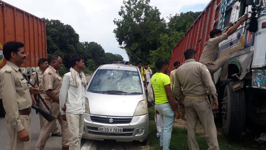 collision of truck and car, six injured