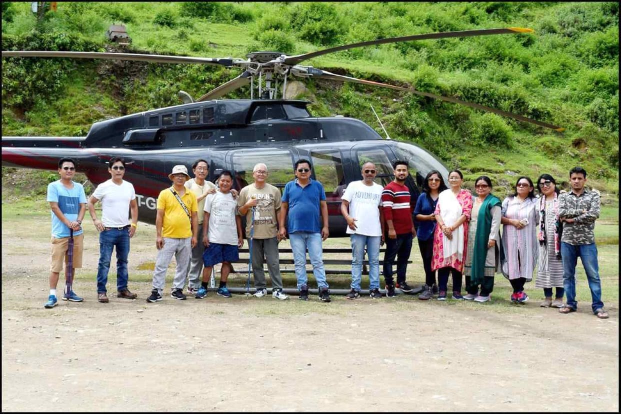 Helicopter flying with three passengers returned due to bad weather