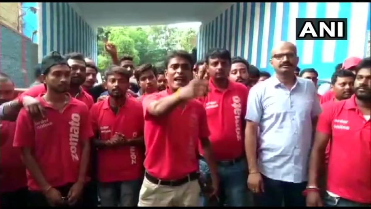 Zomato food delivery executives protesting against delivering beef and pork in West Bengal