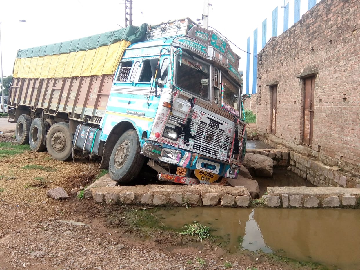 truck hits ambulance, four injured